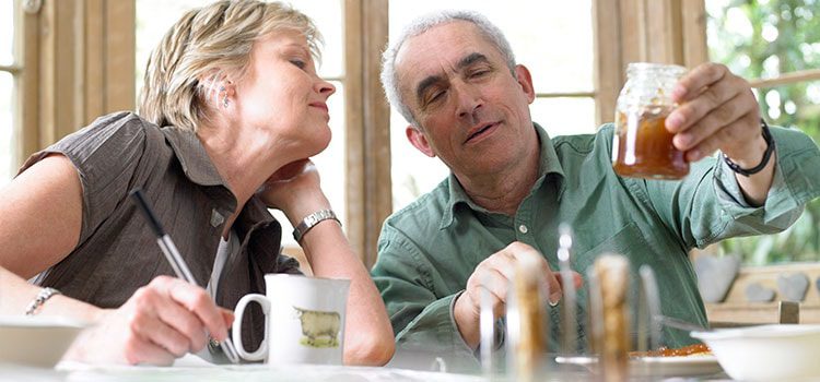 Man and woman talking about food at the dining table