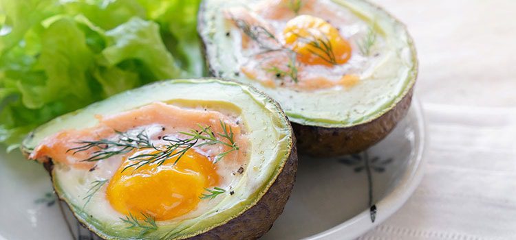 Close up of egg and salmon in an avocado